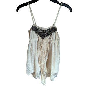 Wet Seal cream flowy tank with beautiful beading at the neckline in a size xs
